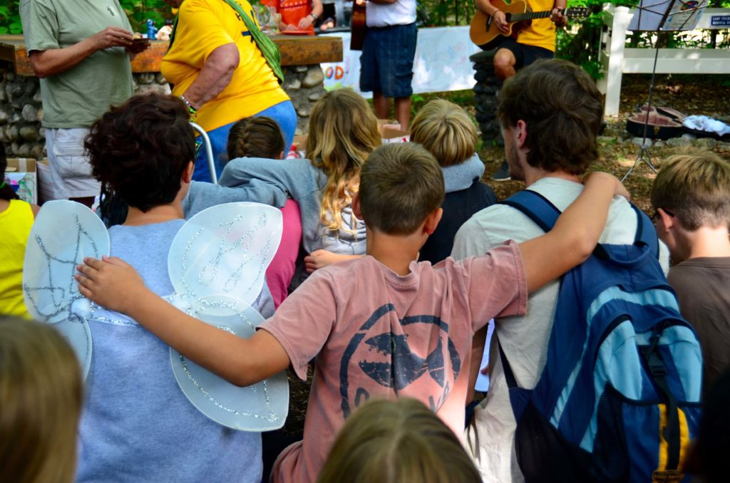 Campers and staff gather in worship at St. Andrew's Chapel at Camp Chickagami.